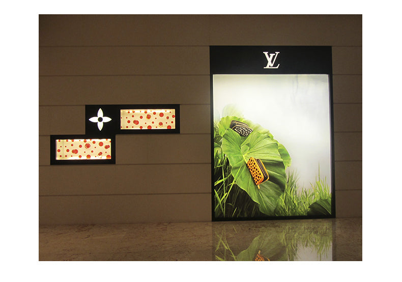 large format retail light box display in luxury store – commercial LED backlighting
