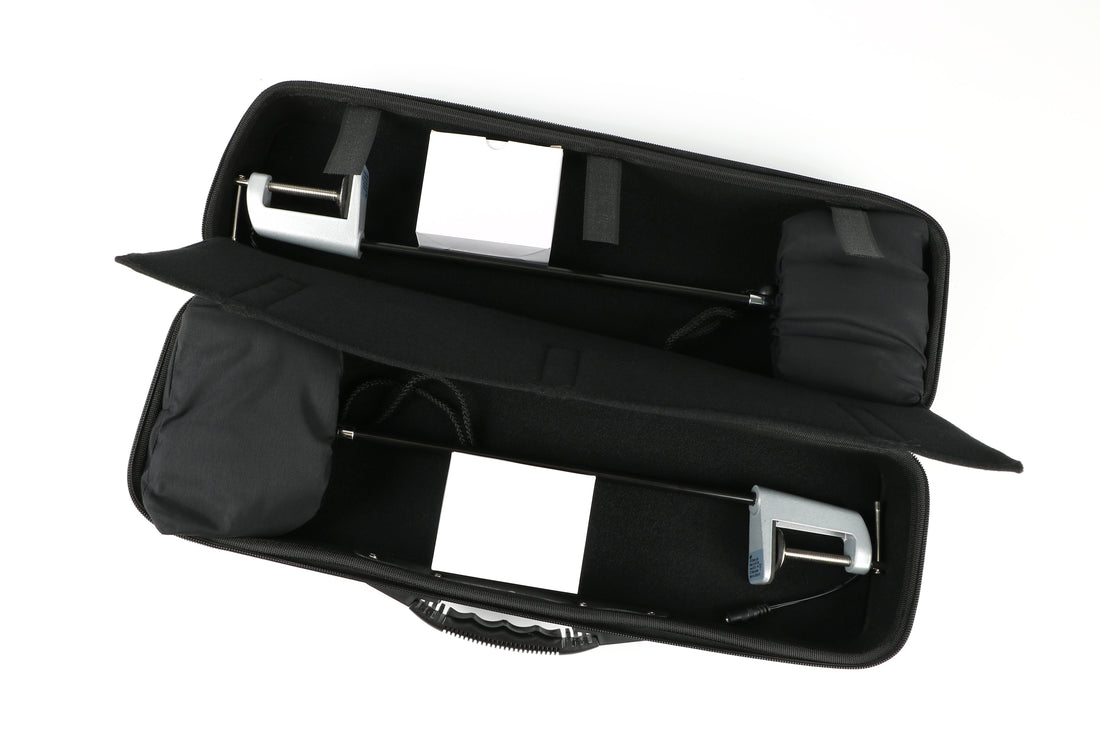 Open EVA hard carrying case with two LED trade show display lights organized inside