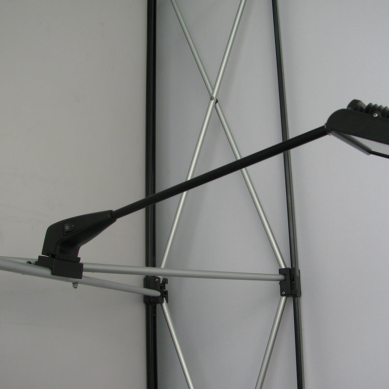 LED display arm light installed on pop-up trade show frame with mounting clip