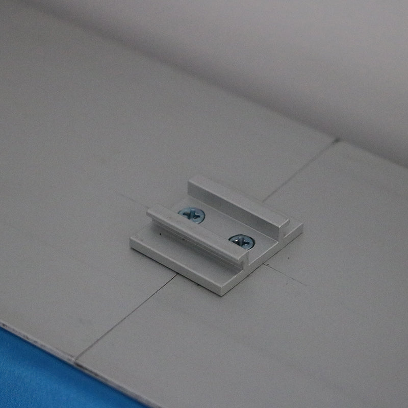 Aluminum mounting bracket bolted to Octanorm extrusion – exhibition lighting direct fix setup