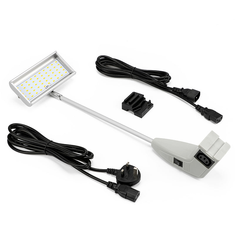 LED light bar with power cord and plug on a white background