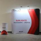 Promotional display with 'Sunlighte' branding and 'Global Display' text on a white wall.