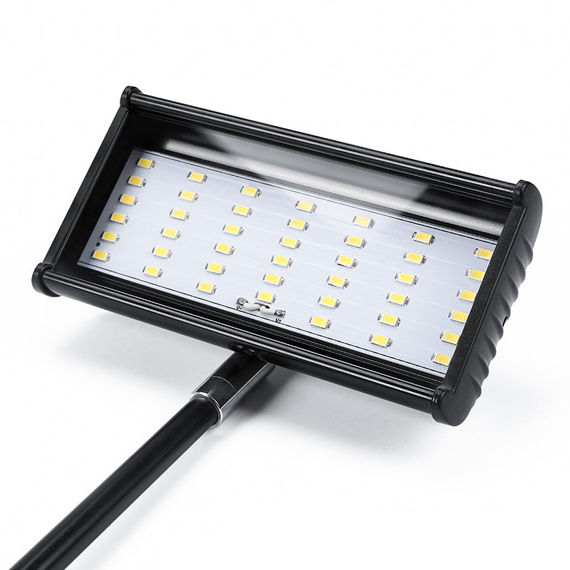 Compact LED display light front view — portable trade show lighting with black housing