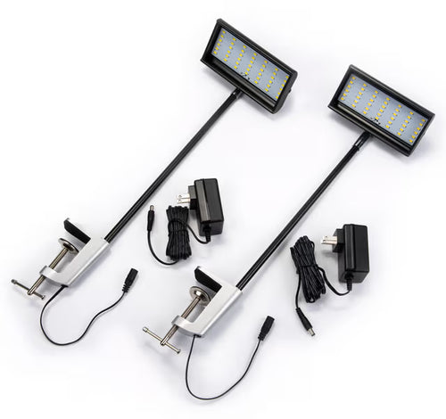 Black LED trade show arm light with clamp-on mount for exhibition booth display