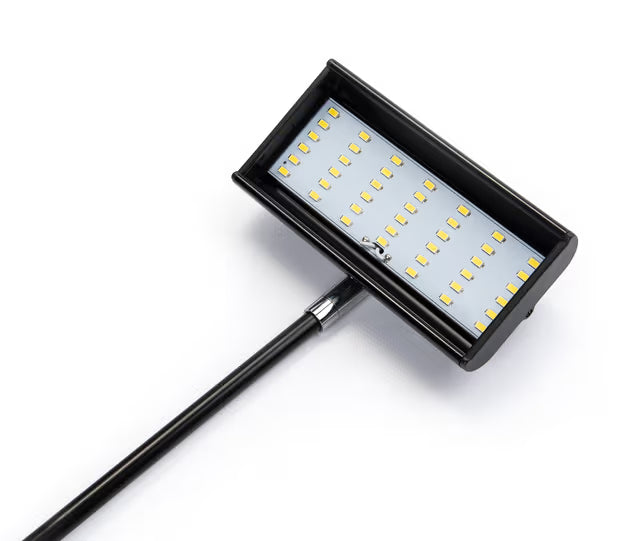 LED exhibition arm light mounted on banner stand using T-slot adapter