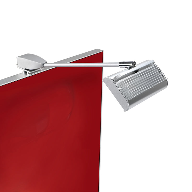 Solid aluminum stem spotlight mounted on top of trade show display wall for focused illumination