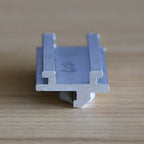 Reusable curved hook trade show light mounting hardware for SEG light boxes
