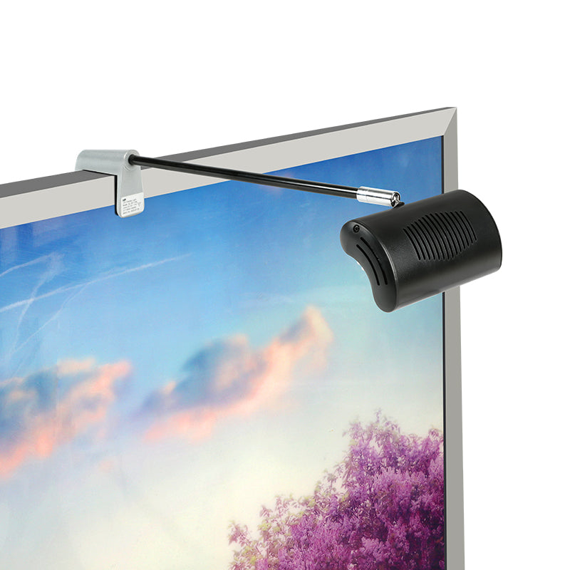 Portable LED display light kit installed on trade show booth graphic panel